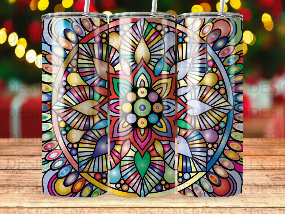 Three tumblers with colorful stained-glass mandala designs.