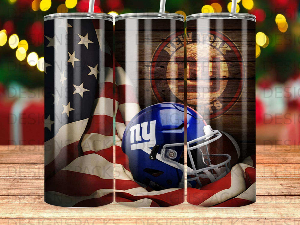 New York Giants helmet and football in front of American flag.