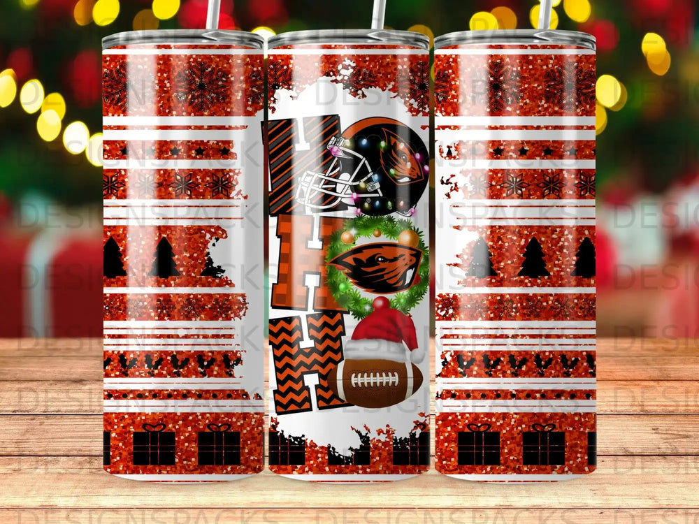 Red and white holiday pattern tumbler with "HO HO HO" and football.