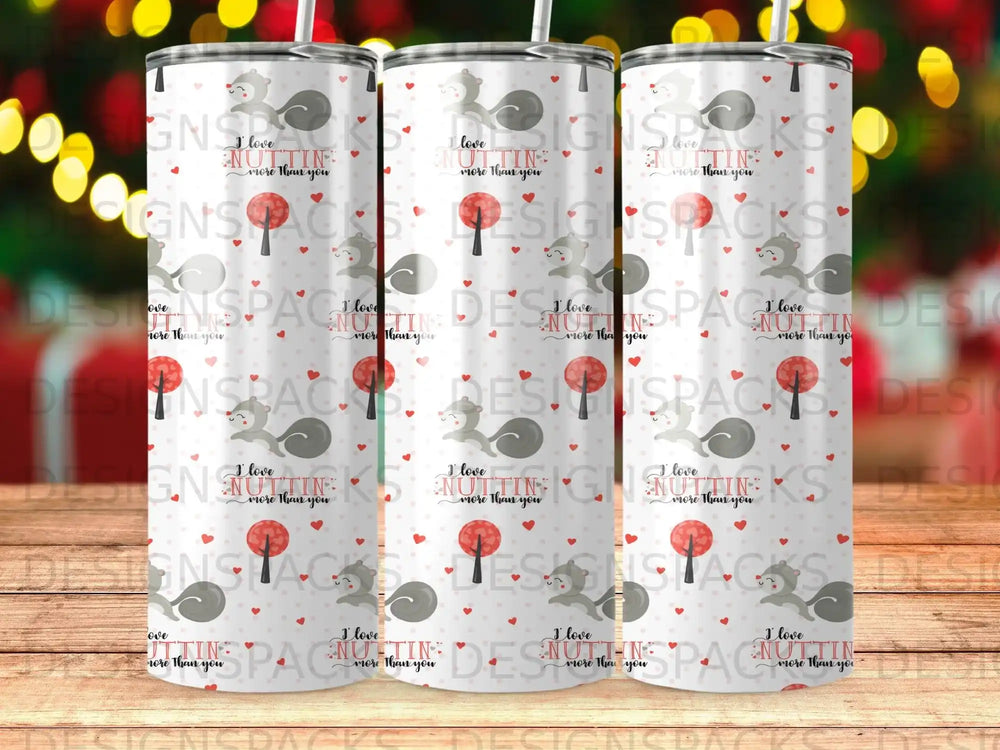 Tumbler with pattern of squirrels holding hearts, "I love you NUTTIN more than you" text.