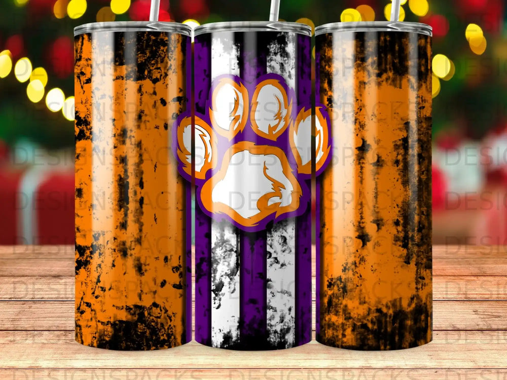 Orange, purple, and white striped tumbler with a paw print design.
