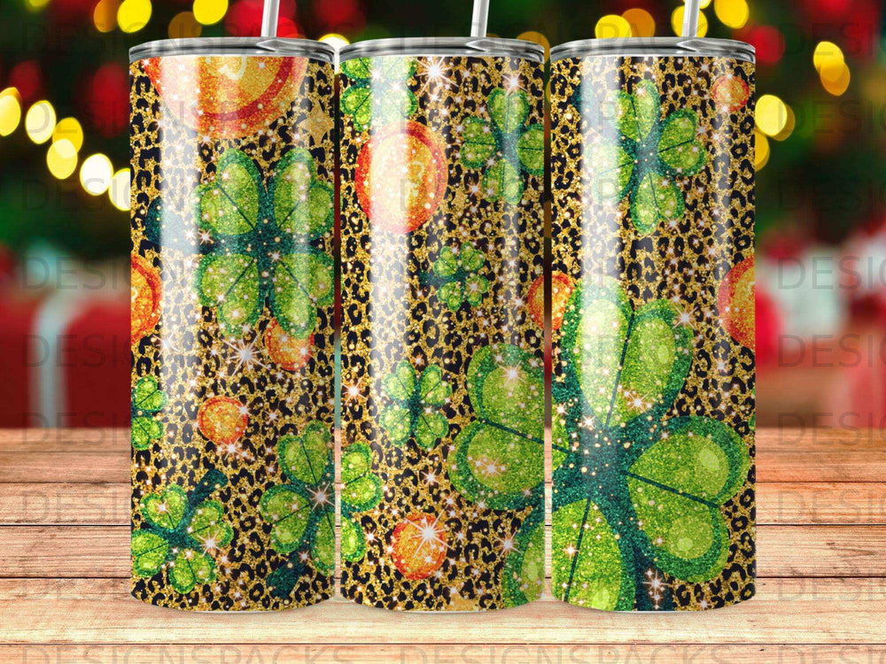 Three tall tumblers featuring a shamrock and leopard print design.