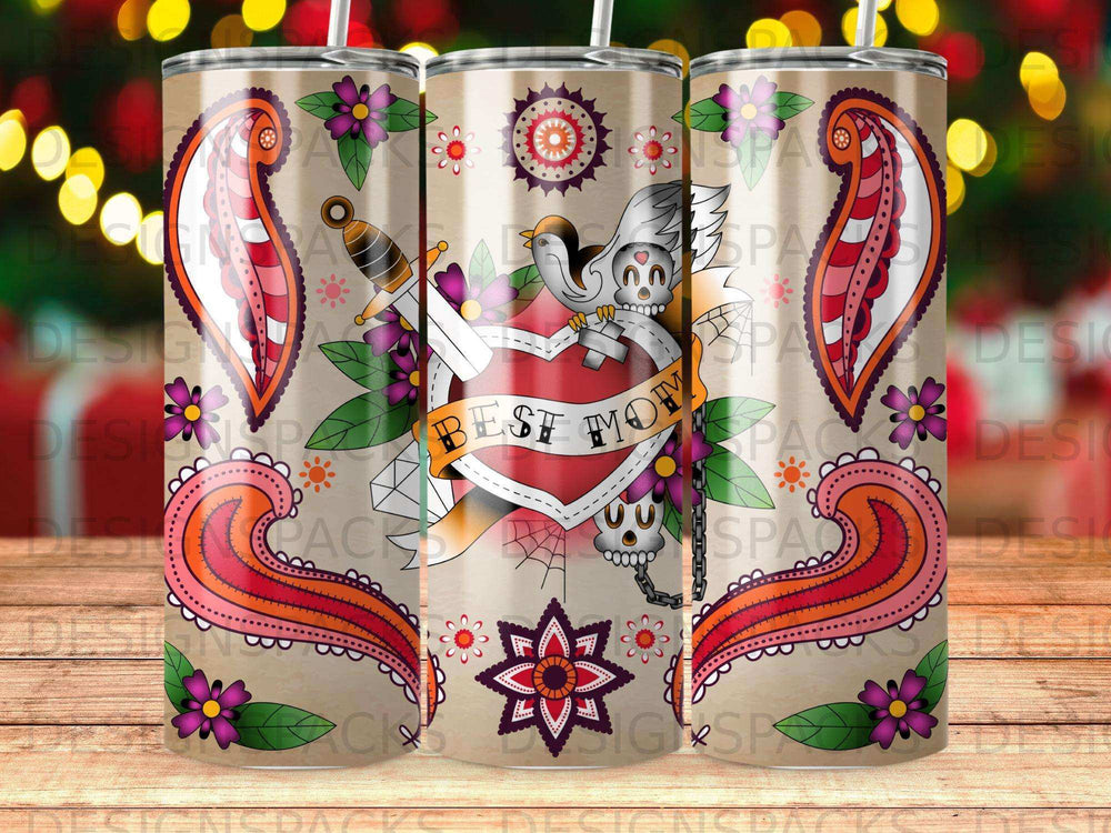 Tumbler with "Best Mom" tattoo design featuring skulls, flowers, and a dagger.