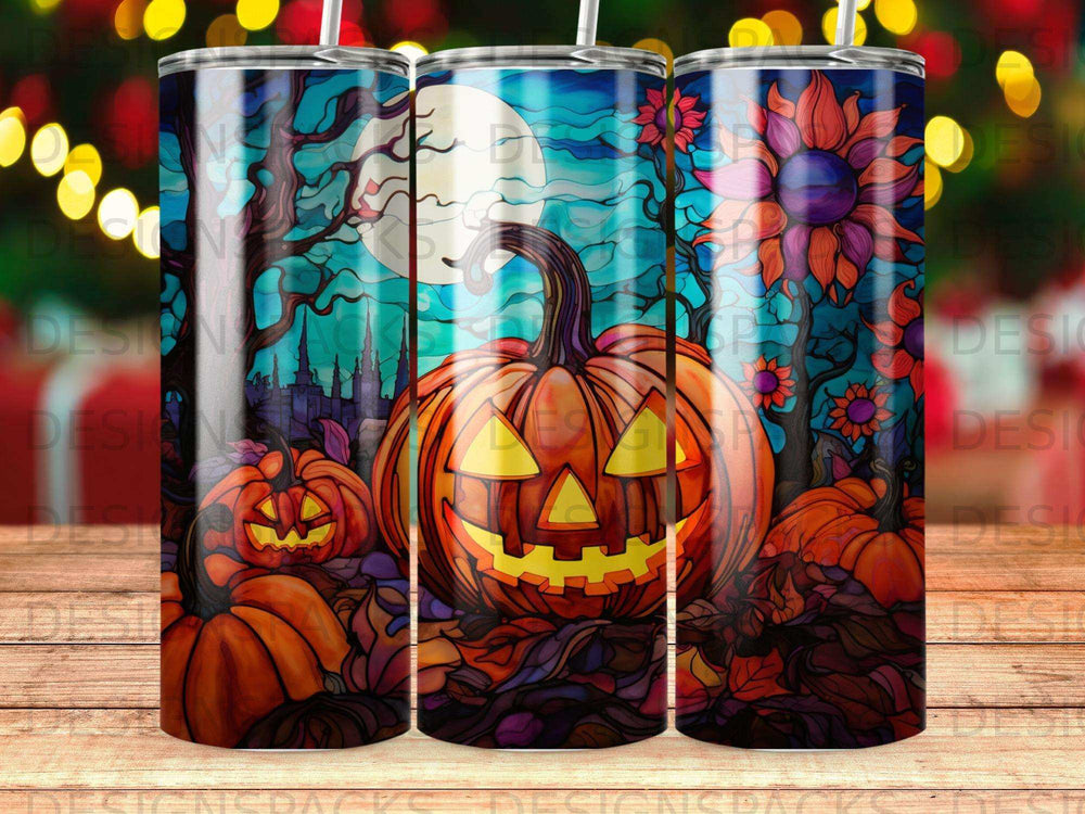Three tumblers featuring a spooky jack-o'-lantern and moonlit Halloween scene.