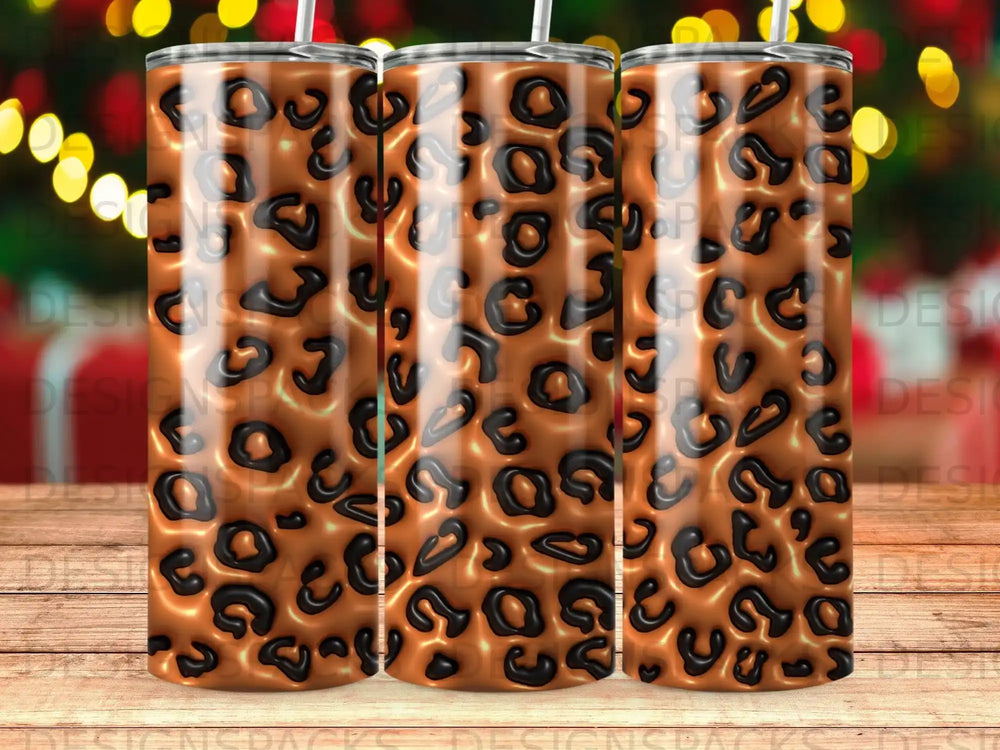 Three tumblers with a brown and black leopard print pattern.