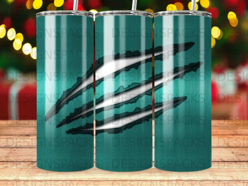 Turquoise tumbler with claw marks and "DESIGNSPACKS" watermark.