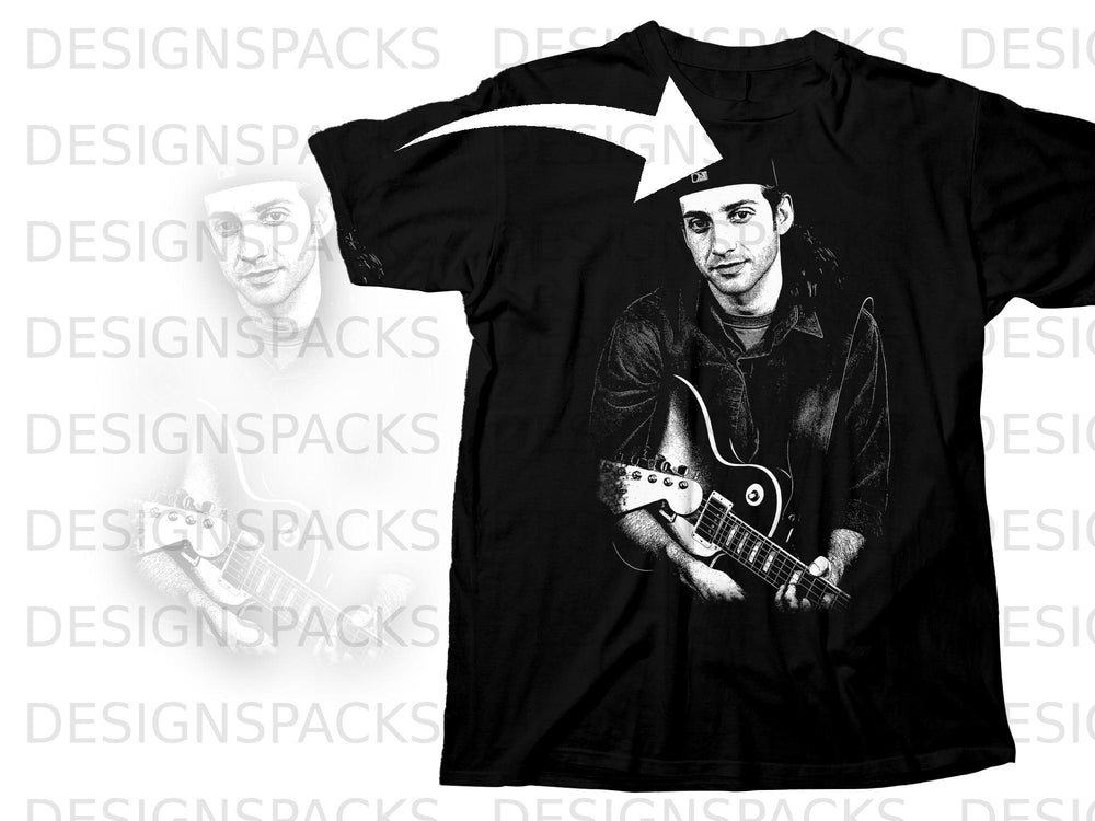 Black t-shirt with a graphic of a man playing a guitar.
