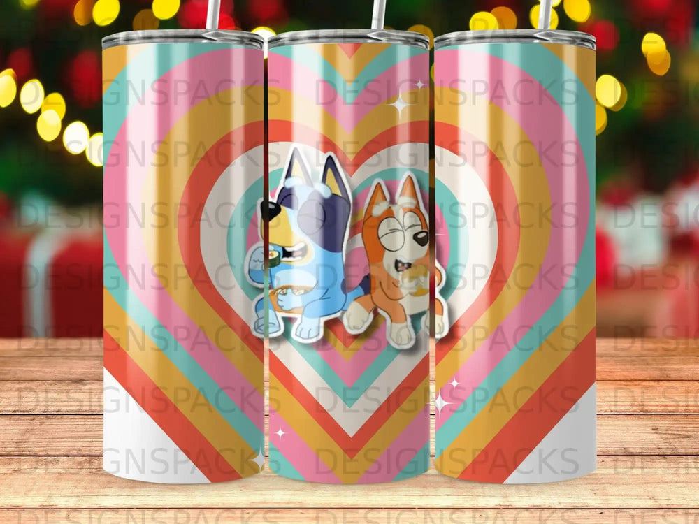 Bluey and Bingo characters on a colorful tumbler with "DESIGNSPACKS" repeating watermark.