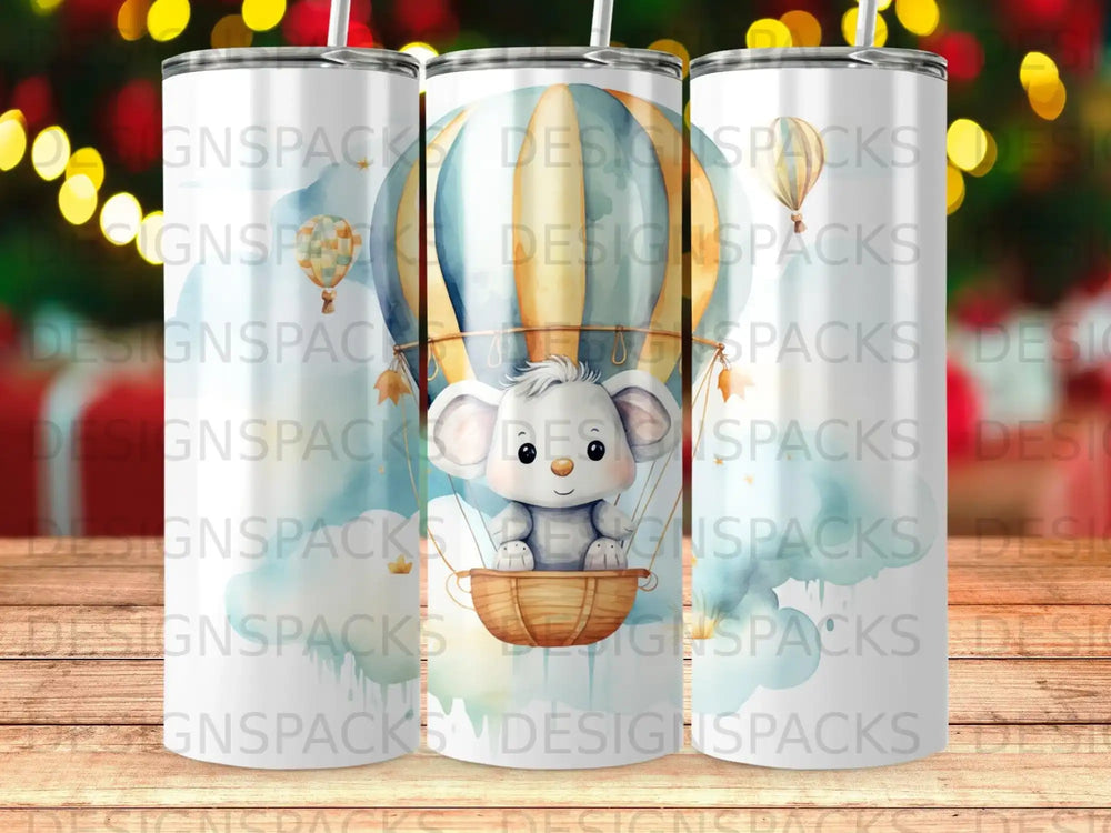 Cute koala in hot air balloon with clouds design on a tumbler.