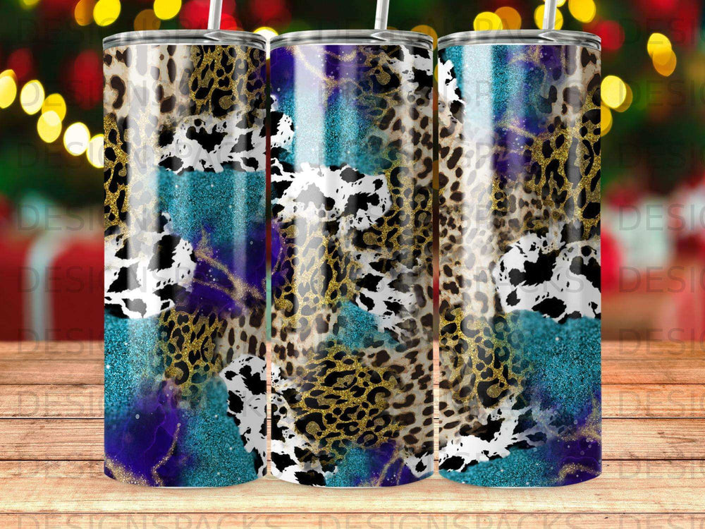 Tumbler with leopard print, cow print, and glitter design.