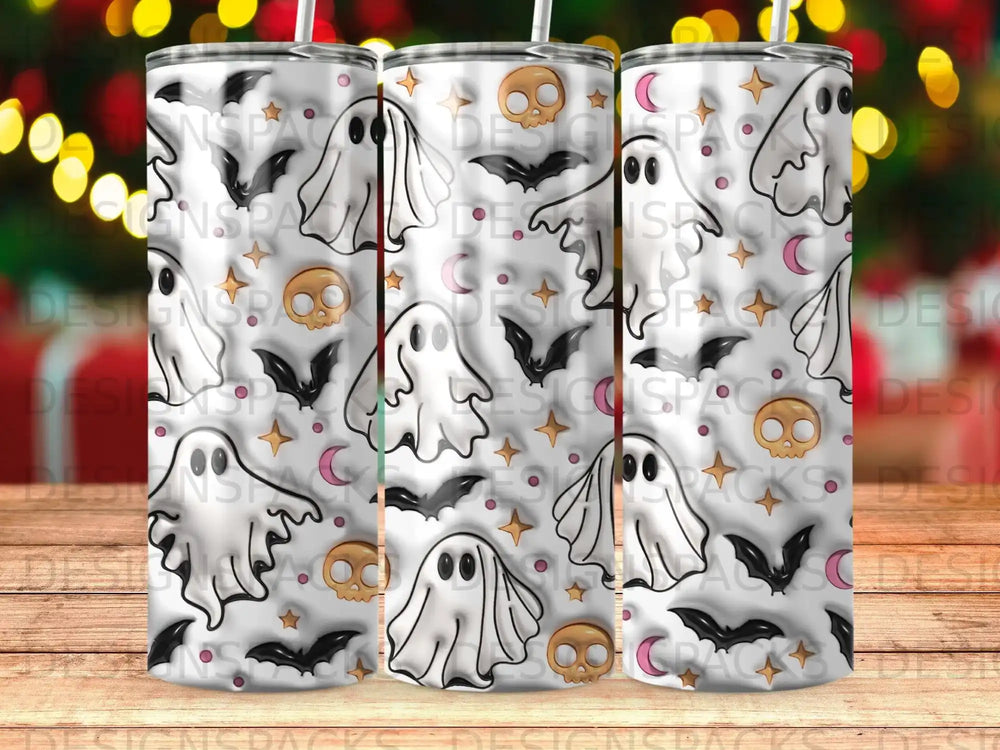 White tumbler with ghost, bat, and star Halloween pattern.