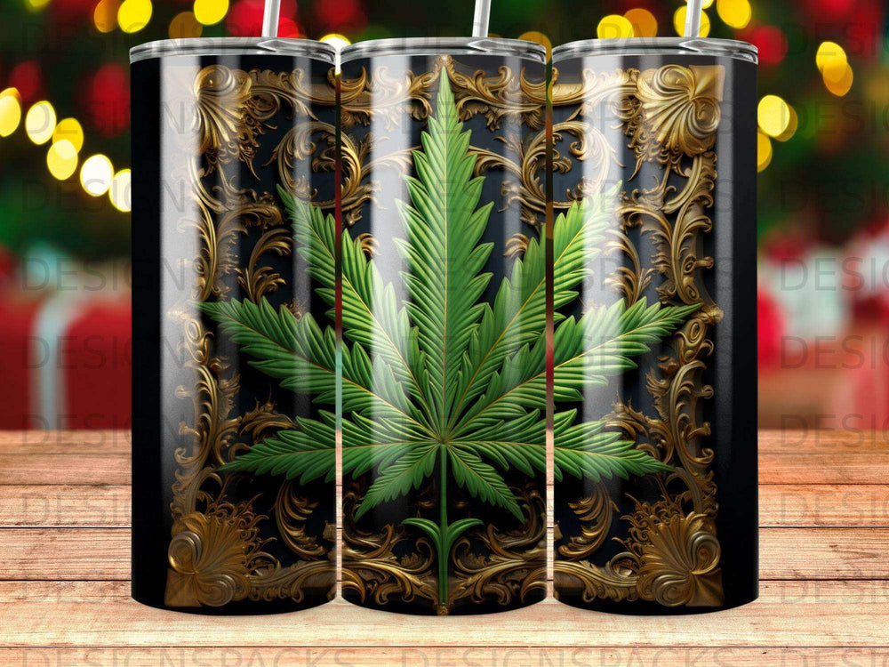 Black tumbler with ornate gold scrollwork and a green cannabis leaf.