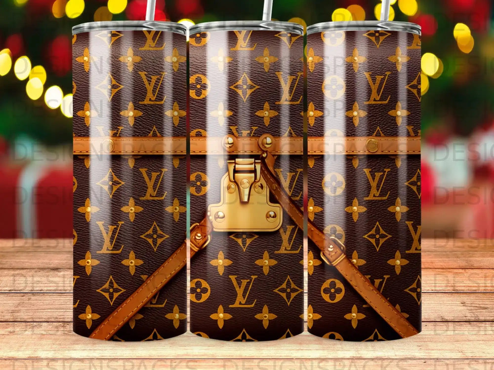 Brown LV monogram tumbler with gold buckle and straps.