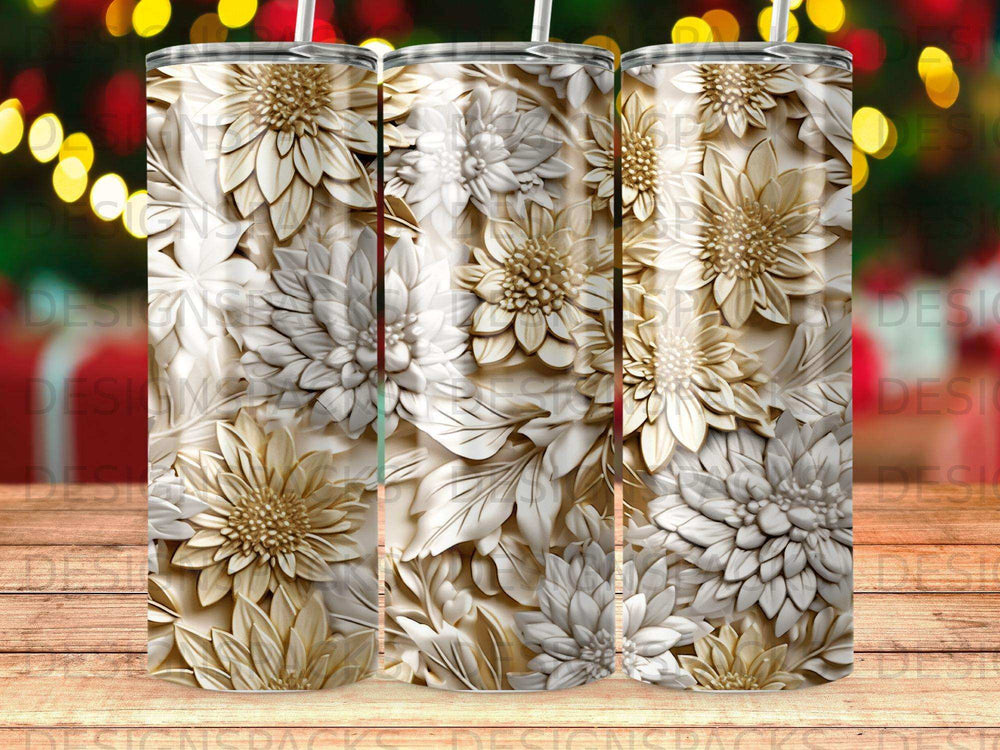 Three identical tumblers with embossed white floral and leaf patterns.