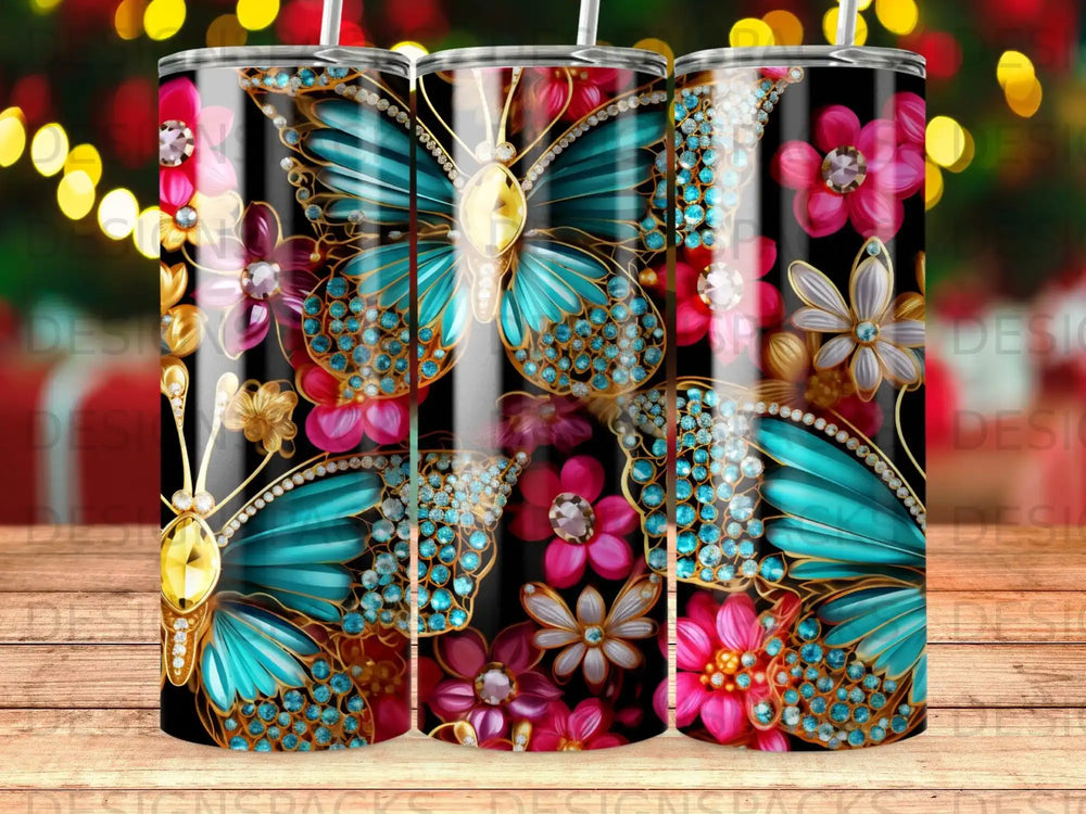 Black tumbler with blue butterflies, pink and purple flowers, and diamond accents.
