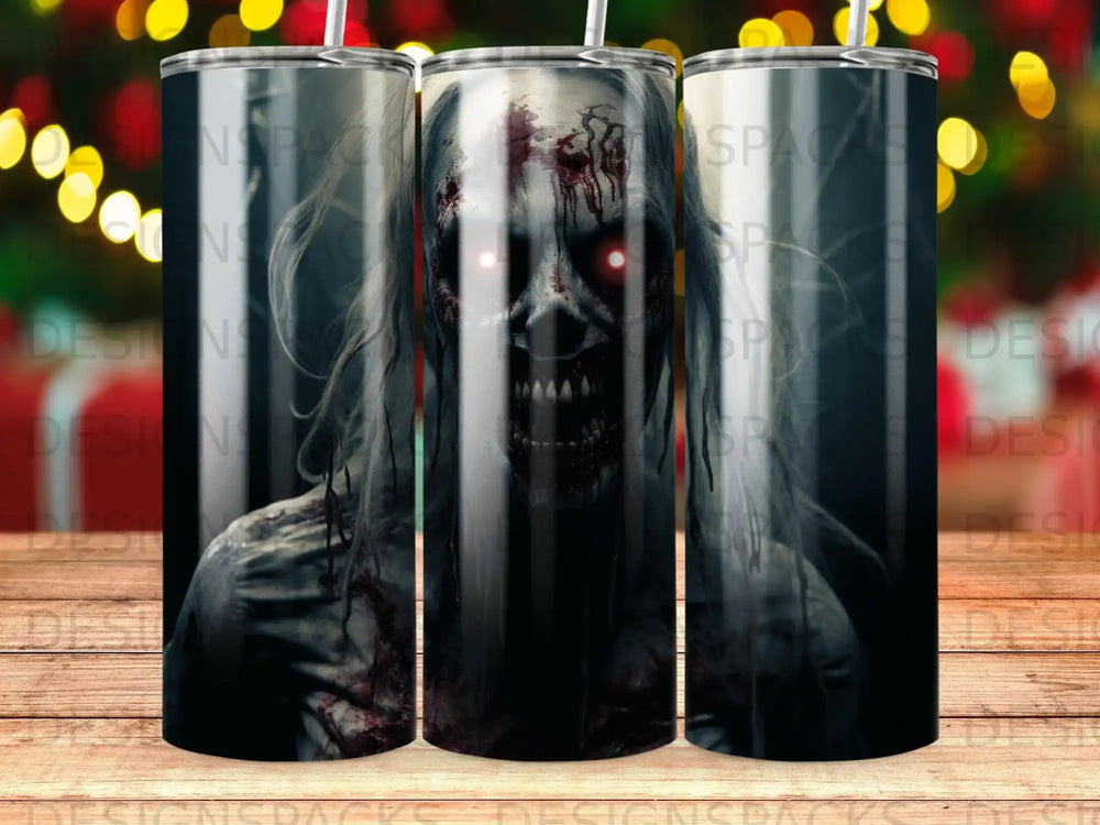 Scary zombie face with glowing red eyes on a black and white patterned tumbler.
