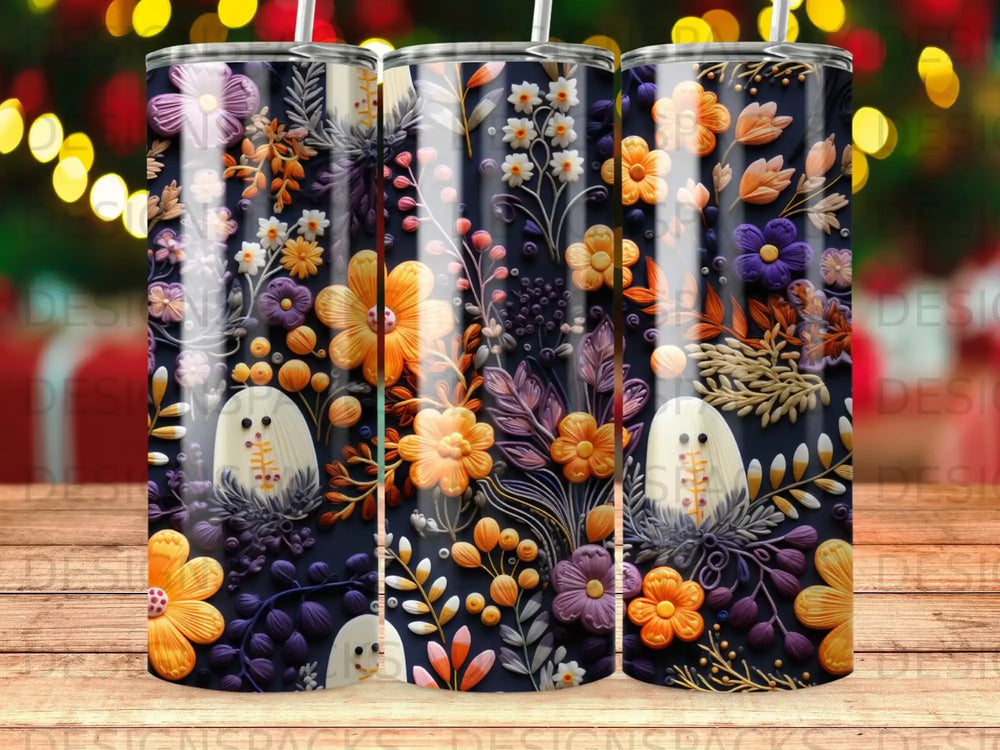 Dark tumbler with ghost and floral pattern.