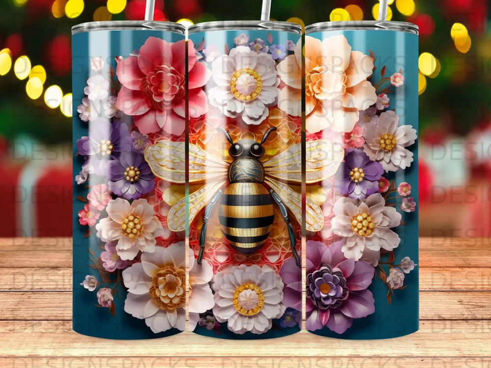 Floral pattern with a bee and honeycomb center on a blue tumbler.