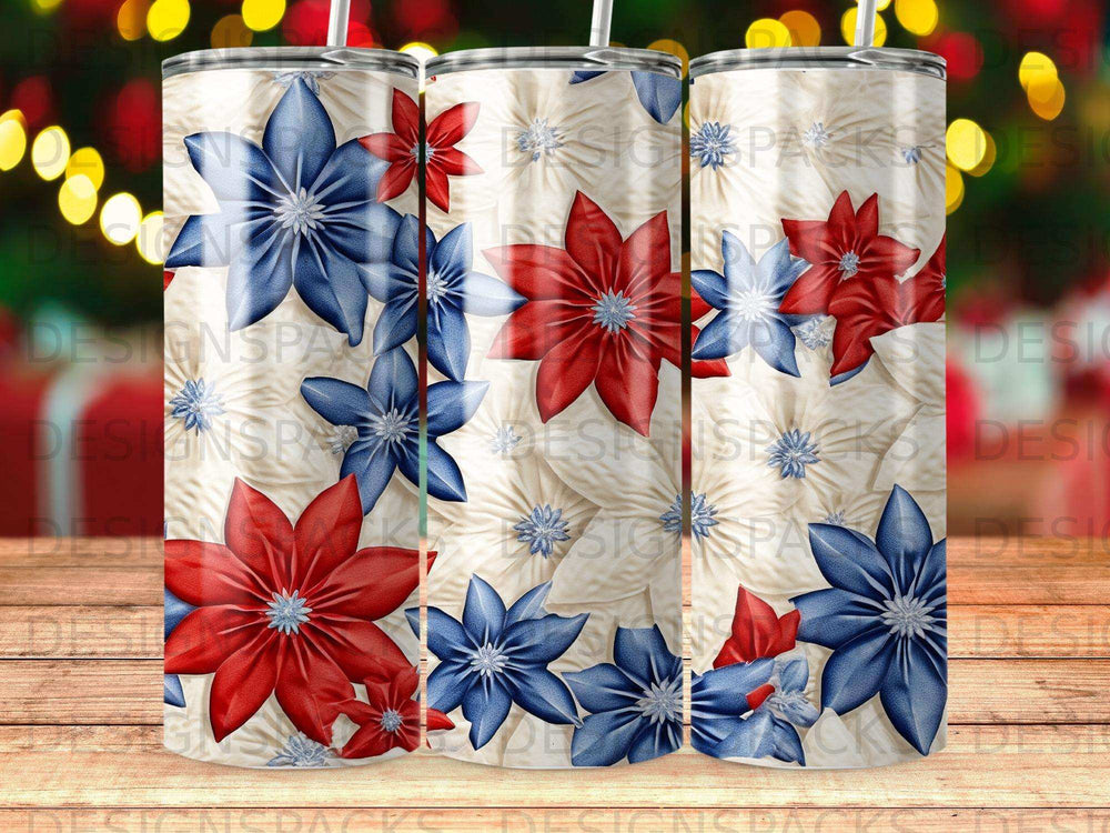 Three tumblers with red, white, and blue floral patterns on a wooden surface.