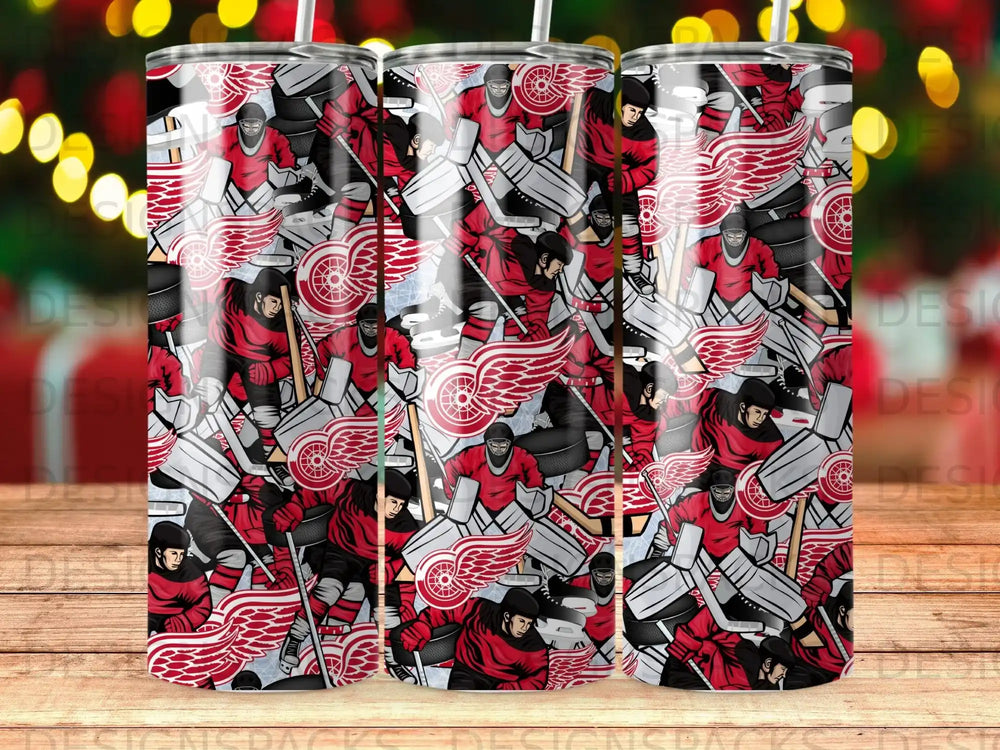 Hockey player pattern with red wings logos and hockey equipment.
