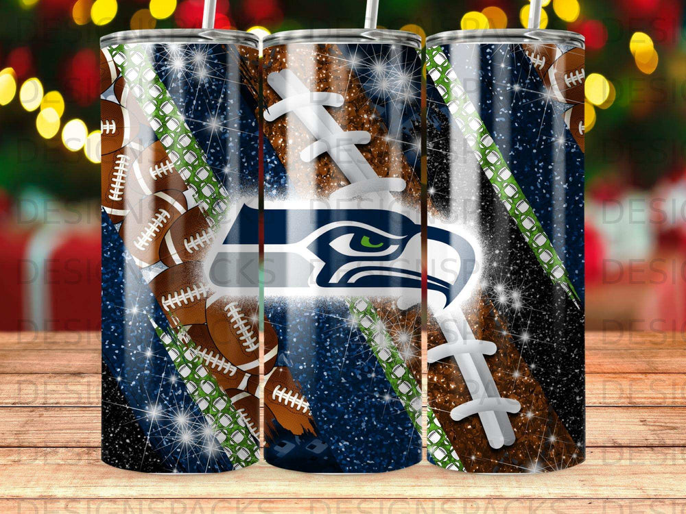 Seattle Seahawks logo on a sparkly football pattern tumbler.