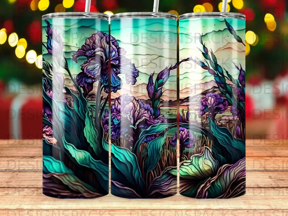 Floral design with purple irises and green foliage against a sunset sky.