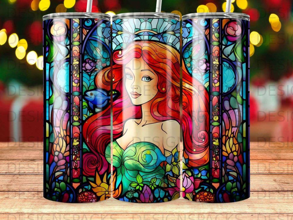 Stained glass tumbler with mermaid and floral designs.
