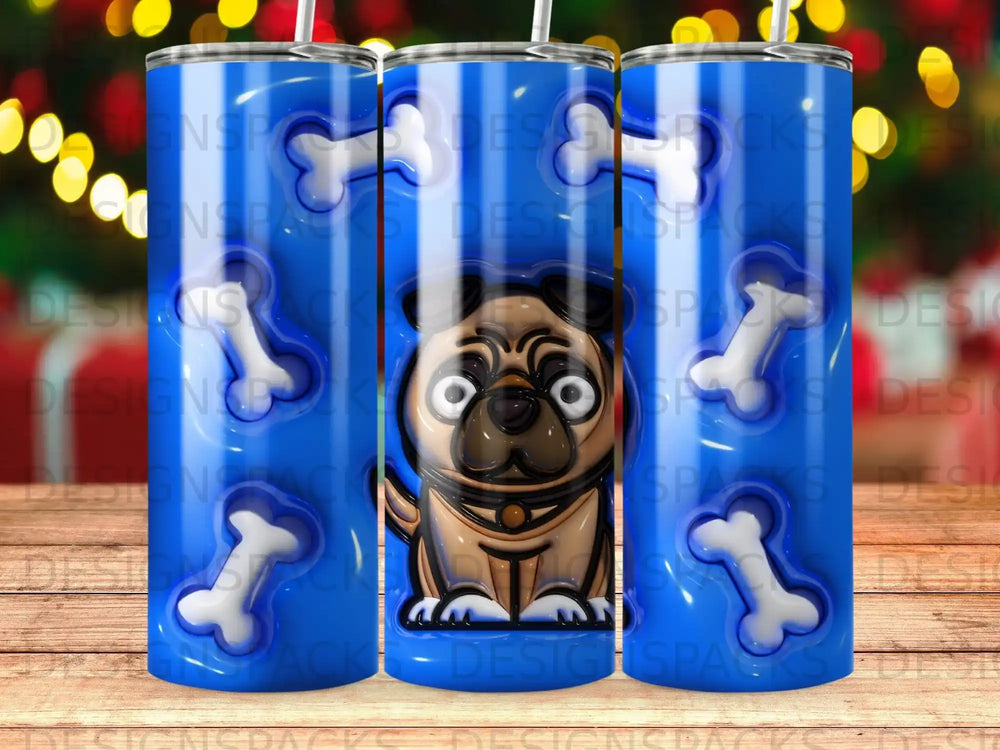 Blue tumbler with a pug and bones pattern, "DESIGNSPACKS" watermark.