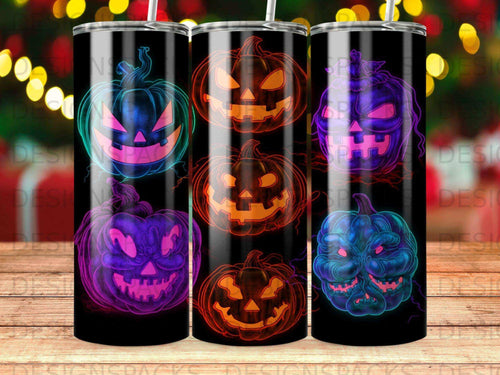 Three tumblers featuring neon jack-o'-lantern designs on a dark background.