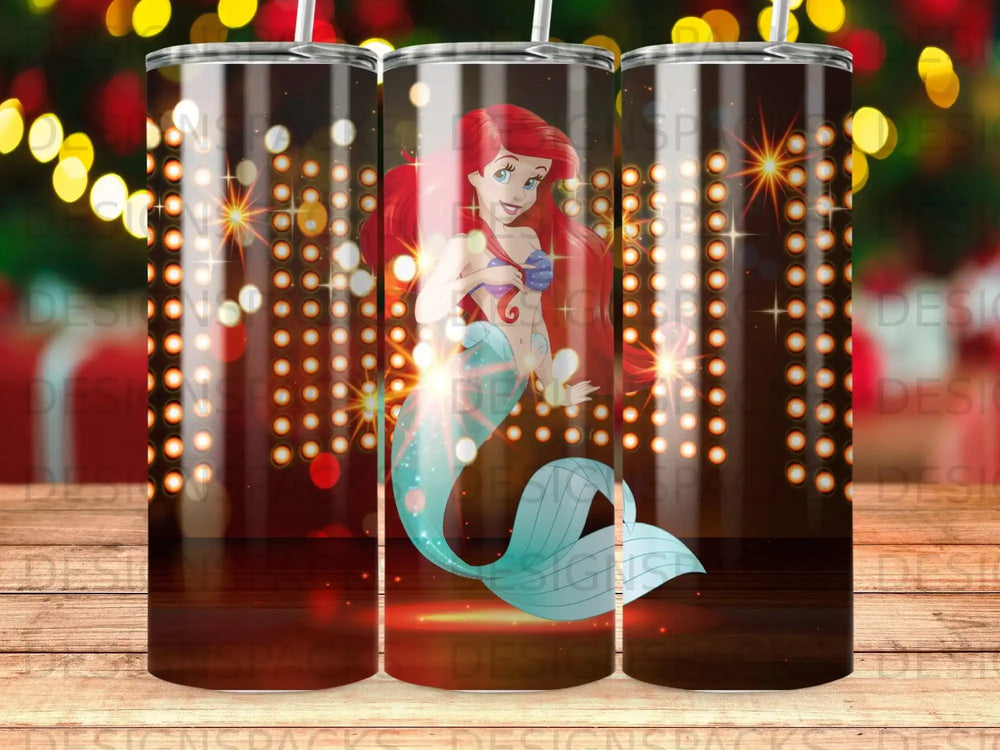 Ariel the mermaid on a tumbler with bokeh lights and a glittery background.