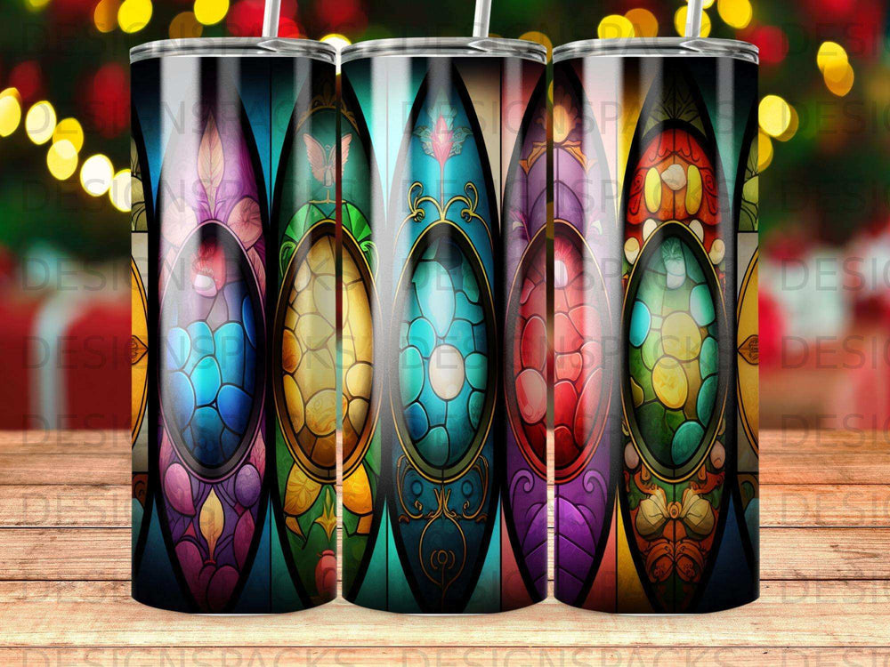 Stained glass design with oval centerpiece on a tumbler.