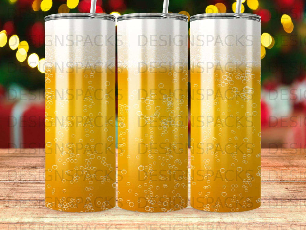 Tumblers with a bubbly beer design on a wooden surface.