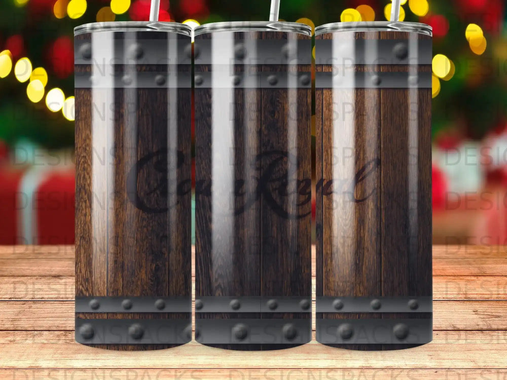Three wood-grain tumblers with metal bands and logos, bokeh background.