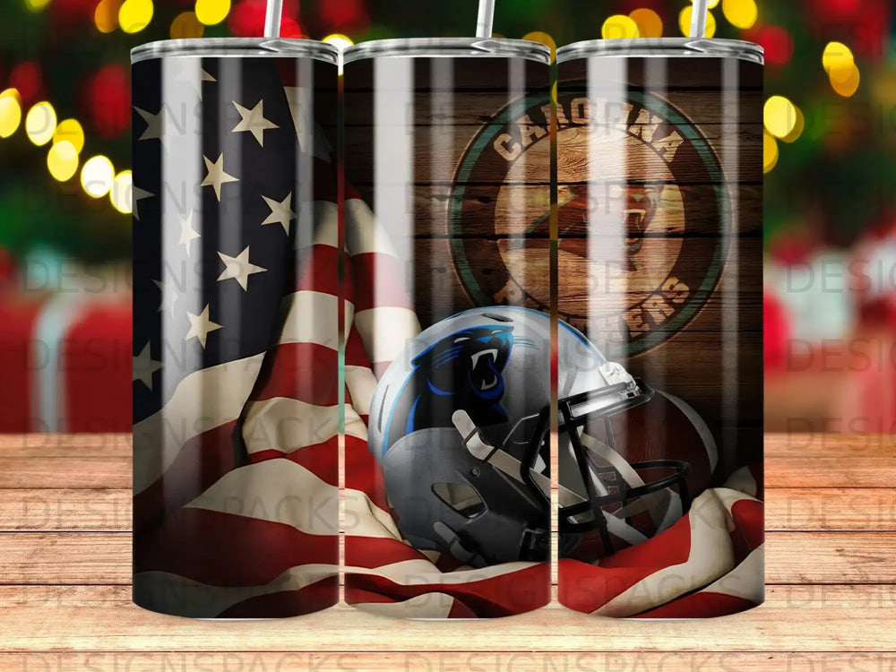 American flag and Carolina Panthers helmet and football on wooden planks.