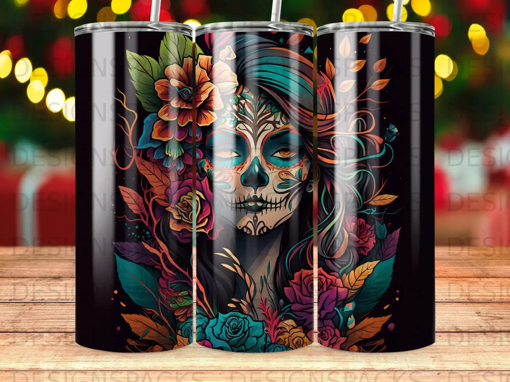 Sugar skull woman with vibrant floral headdress on a black tumbler.