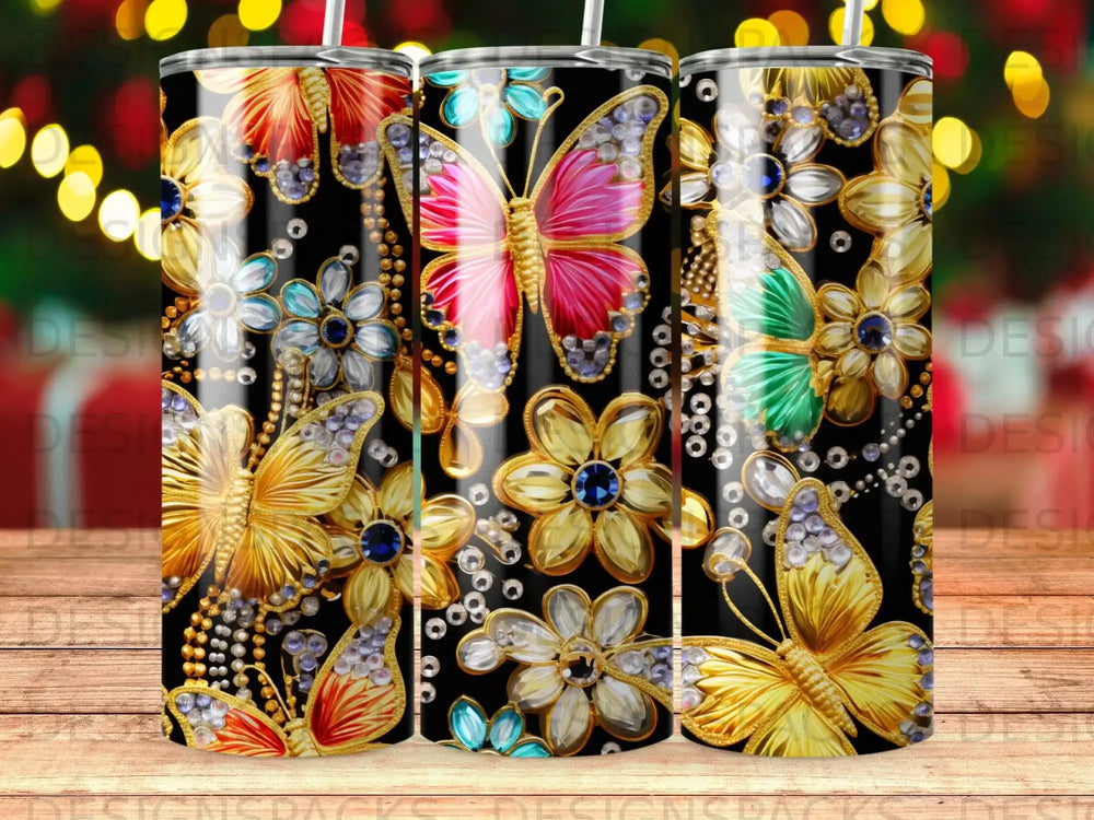 Tumbling colorful butterflies and gold flower embellishments on a black tumbler.