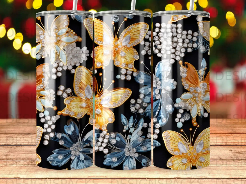Black tumbler with gold and blue butterflies, flowers, and jewels.