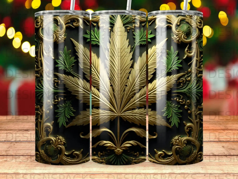 Gold cannabis leaf with ornate scrollwork on a black tumbler.