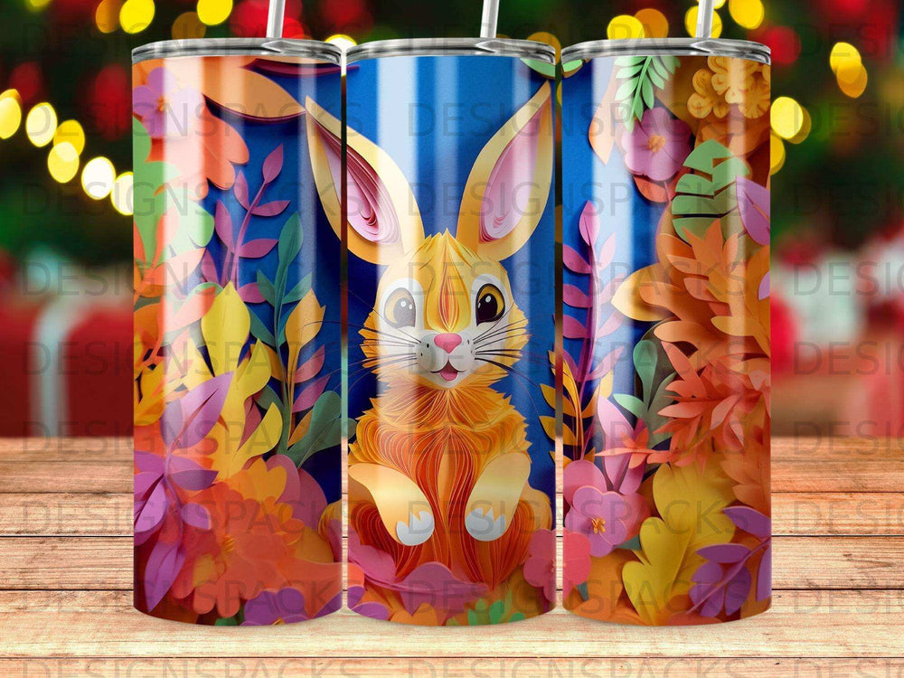 Orange bunny with colorful floral background on a skinny tumbler.