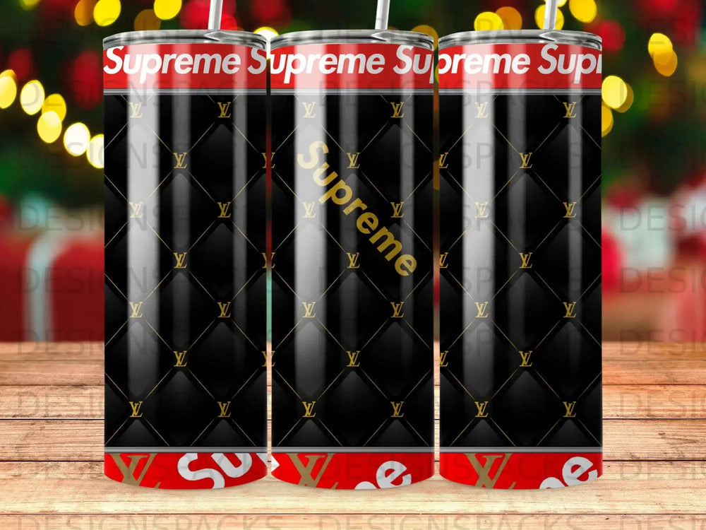 Supreme and Louis Vuitton monogram patterned cylindrical tumbler with red lid.