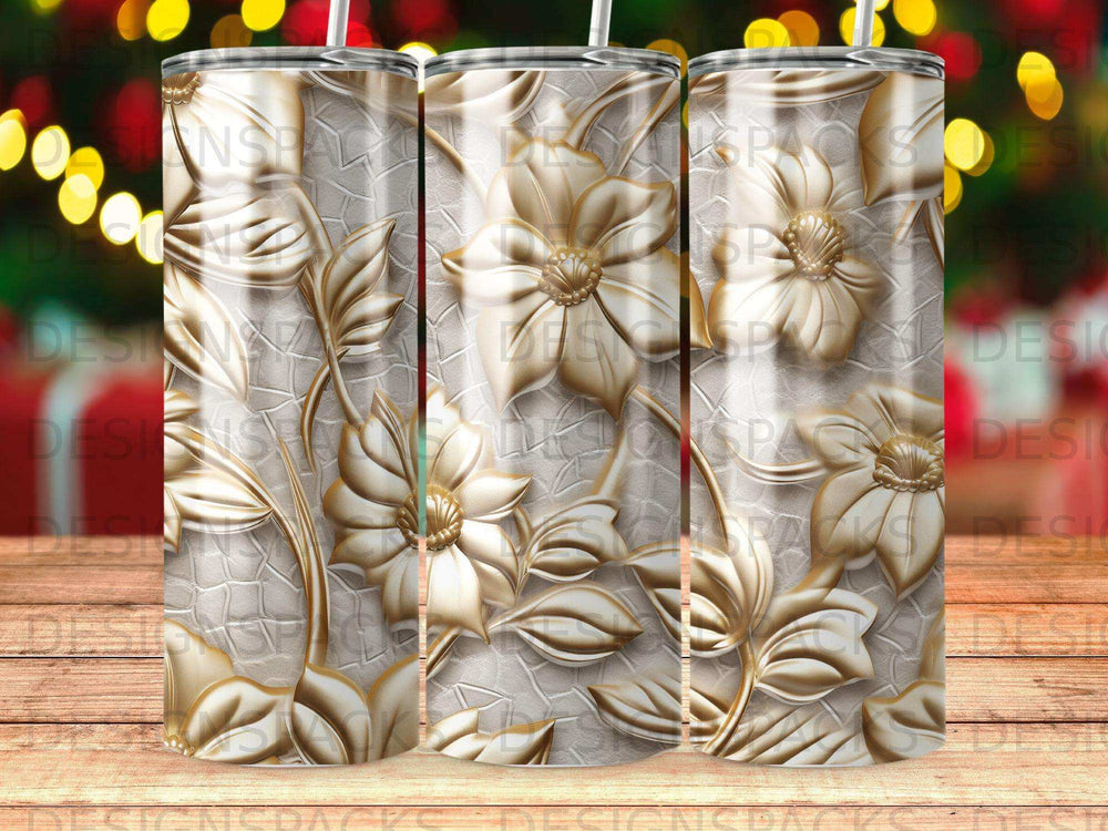 Gold floral pattern on a textured tumbler with repeating watermarks.