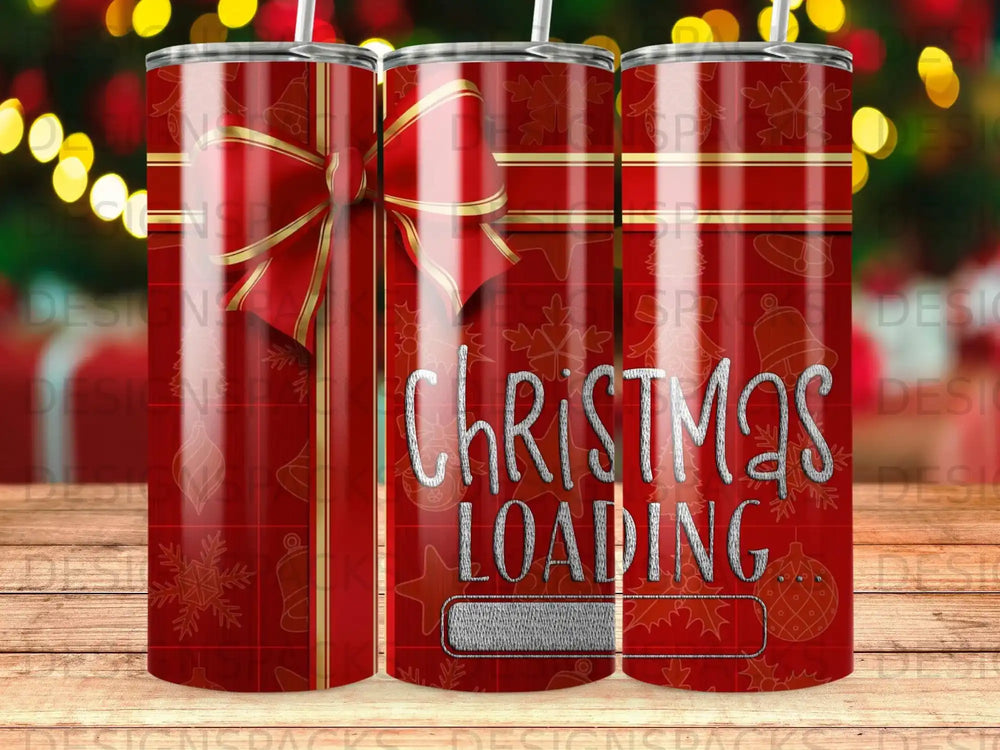 Red tumbler with "Christmas Loading" text and festive ribbon design.