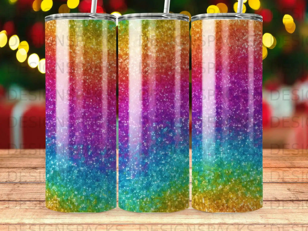 Three tumblers with a glittery rainbow gradient design.