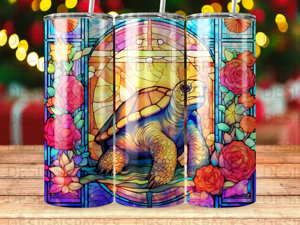 Stained glass turtle surrounded by colorful flowers and a mosaic border.