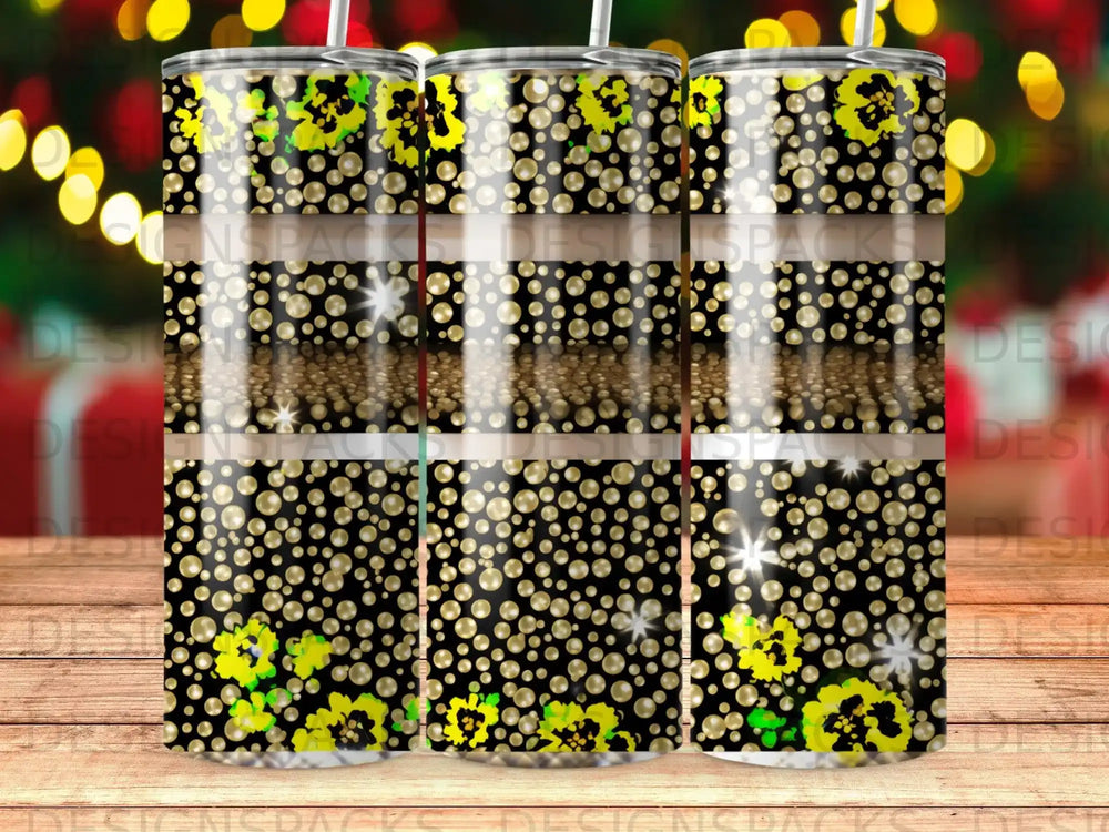 Black tumbler with gold leopard print, green floral accents, and scattered gold dots.
