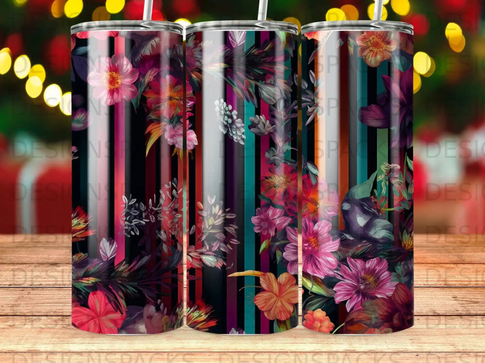 Tumbler with vibrant floral and striped pattern, featuring pink, red, and teal flowers.