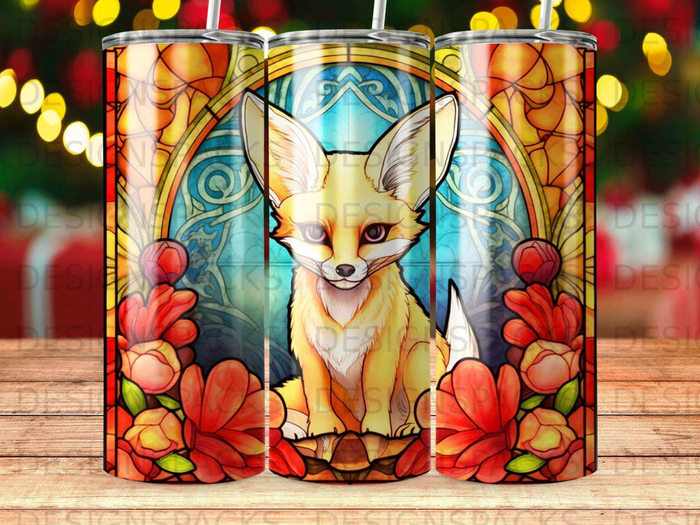 Stained glass fox with floral borders on three tumblers.
