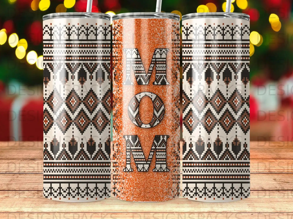 Tumbler with "MOM" in glittery orange letters and a geometric patterned background.