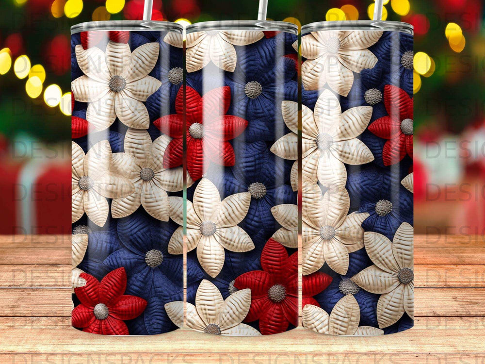 Red, white, and blue floral pattern on three tumblers.