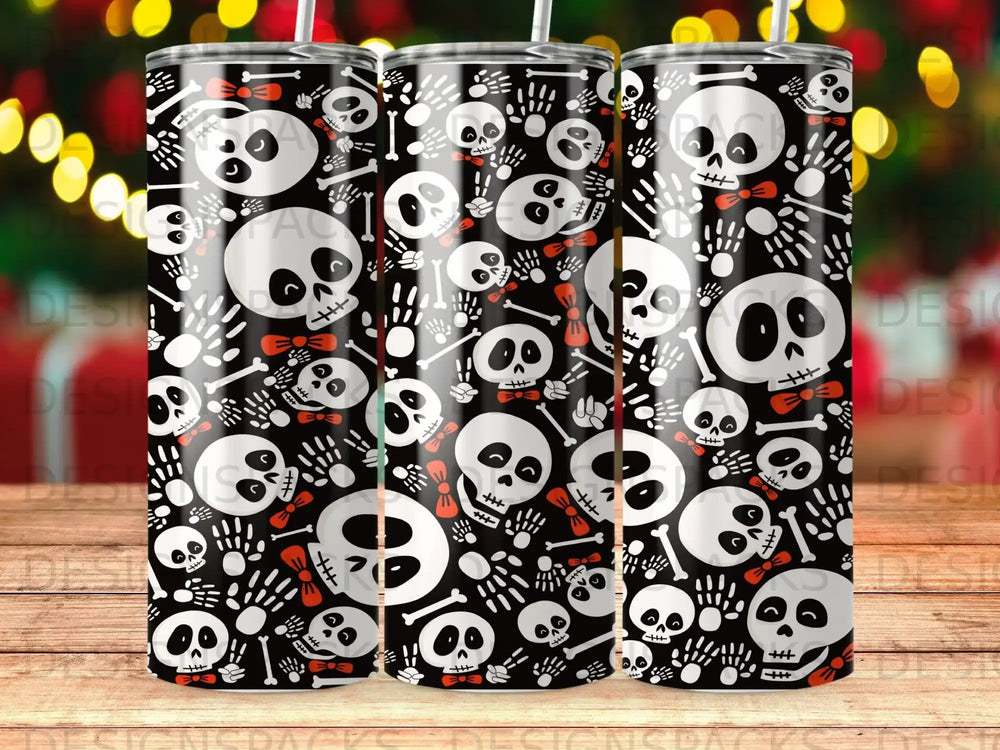 Tumbler with a repeating pattern of cartoon skulls with bows and bones.